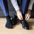 Merino Business Socken schwarz mit Anzug und Lederschuhen – elegante Herrensocken WOOL ROCKERS